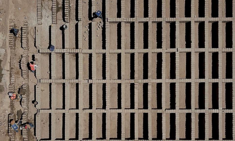 Workers build 700 graves at the Mezquitán Pantheon cemetery in preparation for possible coronavirus victims in Guadalajara last month.