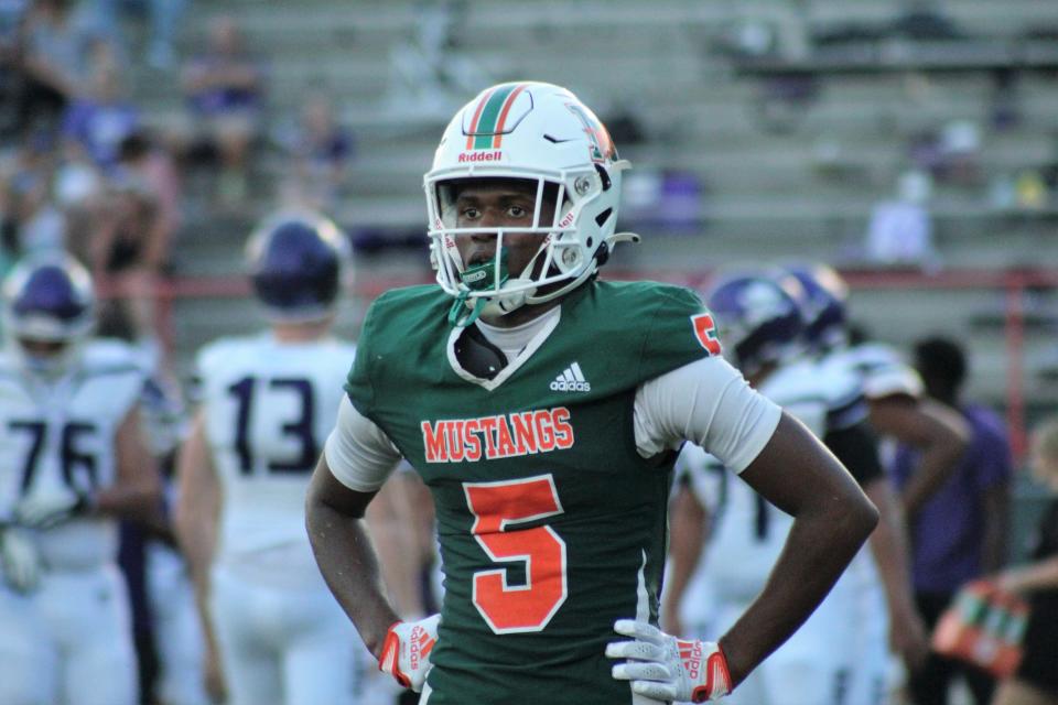 Jon Mitchell looks to the sideline during a break in play in Mandarin's game against Fletcher.