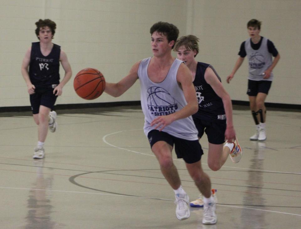 Tyler Tift moves the ball up court in a recent Habersham School practice.