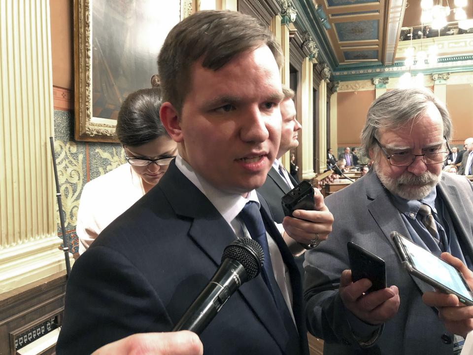 FILE - In this Dec. 13, 2018, file photo, Republican Rep. James Lower of Cedar Lake speaks to reporters in Lansing, Mich. Rep. Justin Amash of Michigan, the first Republican in Congress to accuse President Donald Trump of impeachable conduct, is facing a primary challenge from Lower, who announced his candidacy Monday, May 20, 2019, for the 3rd Congressional District in western Michigan. The announcement came two days after Amash sent a series of tweets faulting Trump and Attorney General William Barr over special counsel Robert Mueller's investigation into Russian meddling in the 2016 election. (AP Photo/David Eggert, File)