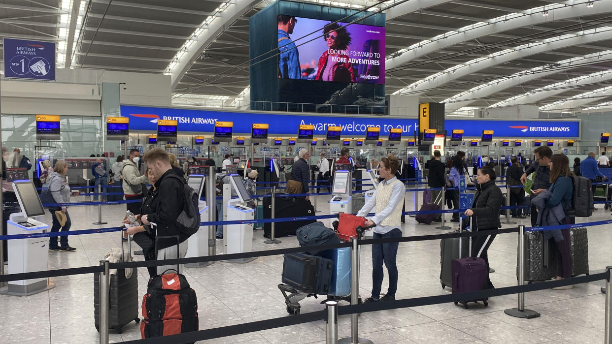 Passengers queue to check-in bags in departures at Terminal 5 of Heathrow Airport, west London. Picture date: Saturday April 23, 2022.