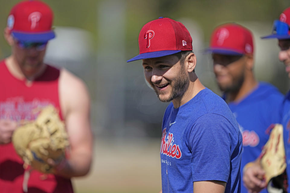 Philadelphia Phillies shortstop Trea Turner smiles during a spring training baseball workout Friday, Feb. 17, 2023, in Clearwater, Fla. (AP Photo/David J. Phillip)