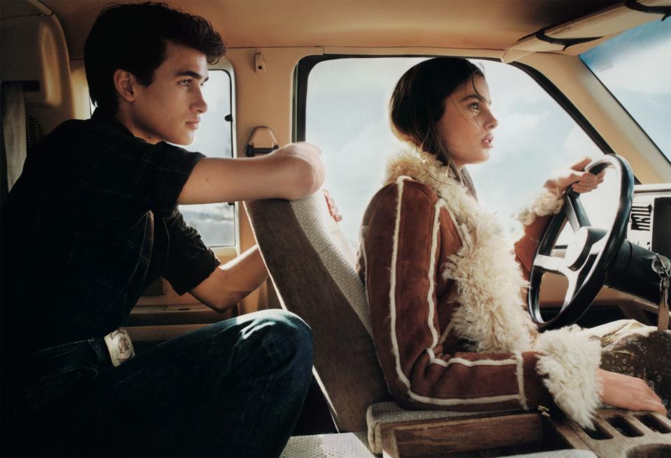 “Growing up in Colorado, we’d let our imaginations run wild and play games and climb trees and pretend we lived in the woods—and when I go there now it seems magical,” says Taylor Hill. On Taylor: Balmain jacket; balmain.com. On her brother, model Chase Hill: Polo Ralph Lauren shirt. Levi’s jeans.