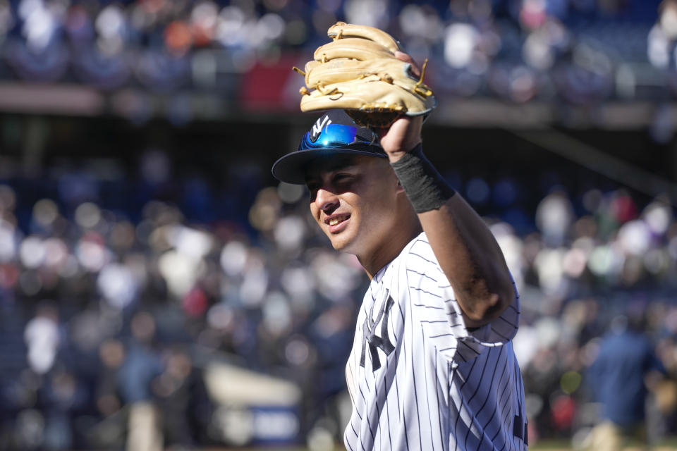 New York Yankees' Anthony Volpe waves as he leaves the field after the baseball game against the San Francisco Giants at Yankee Stadium Thursday, March 30, 2023, in New York. The Yankees defeated the Giants 5-0. (AP Photo/Seth Wenig)