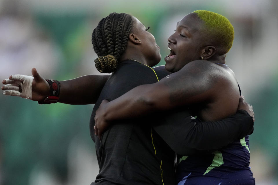 Jessica Ramsey, left, celebrates her first place finish with second place, Jessica Ramsey after the finals of the women's shot put at the U.S. Olympic Track and Field Trials Thursday, June 24, 2021, in Eugene, Ore. (AP Photo/Ashley Landis)