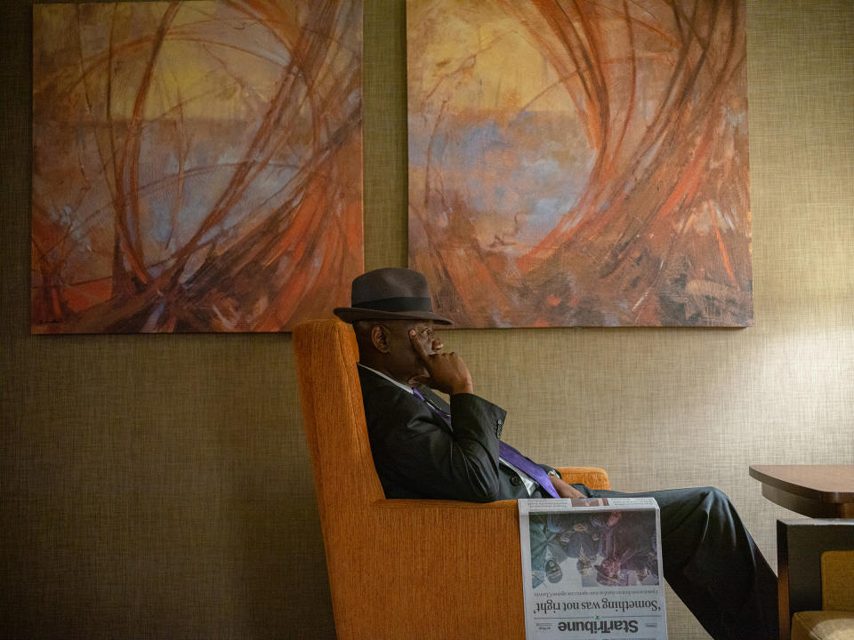 Crump rests after reading the paper in the lobby of the Westin Hotel in Minneapolis on March 30.<span class="copyright">Ruddy Roye for TIME</span>