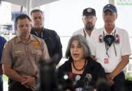 Miami-Dade mayor Daniella Levine Cava gives her remarks during the daily morning press conference outside the County's operational center on Sunday, July 11, 2021 in Surfside, Fla. Miami-Dade and Surfside mayors updated the media on the overnight and daily operational details after the partial collapse of the Champlain Towers South. (Carl Juste/Miami Herald via AP)