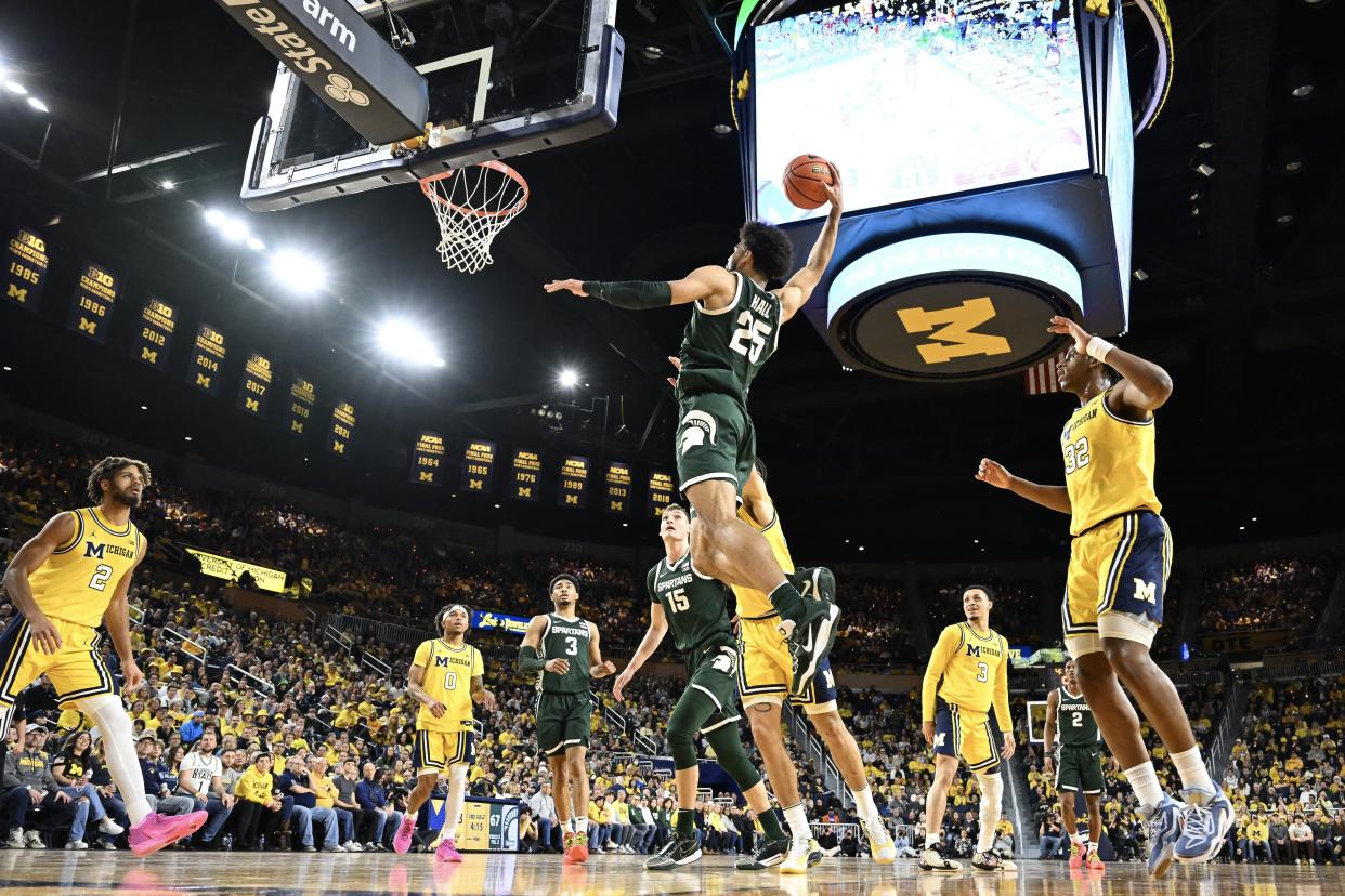 Malik Hall of the Michigan State Spartans dunks against the Michigan Wolverines in the second half at Crisler Center in Ann Arbor on Saturday, Feb. 17, 2024.