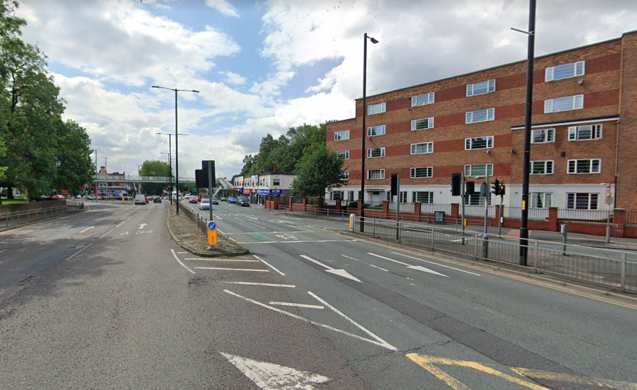 A 71-year-old woman died after being hit by a car involved in a police chase at the junction of Kingsway and Wilmslow Road in Manchester. (Google)