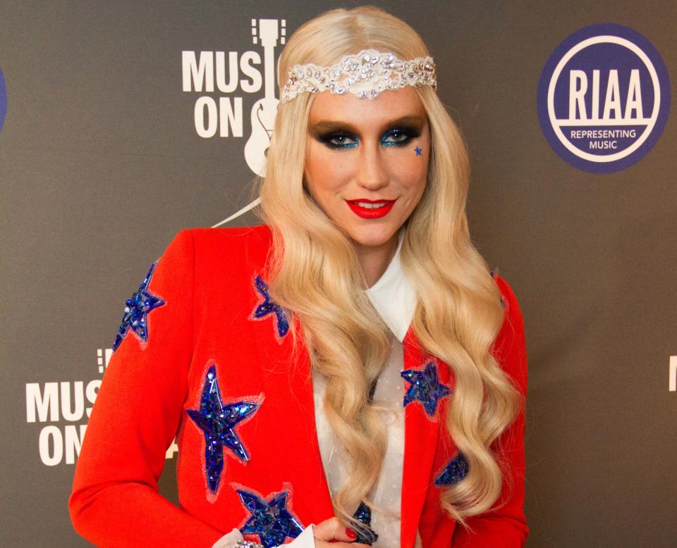 Ke$ha arrives at the 2013 Presidential Inaugural Charity Benefit, on Monday, Jan. 21, 2013 in Washington. (Photo by Stephen Boitano/Invision/AP)