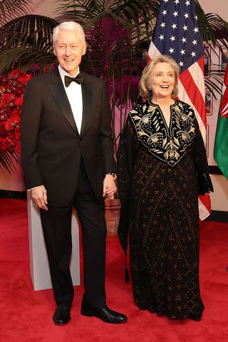 <p>Tasos Katopodis/Getty</p> Bill Clinton and Hillary Clinton arrive at the State Dinner for Kenyan President William Ruto and his wife Rachel Ruto