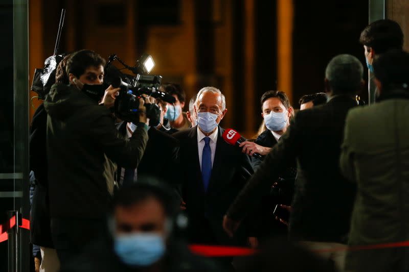 Re-elected Portugal's President Marcelo Rebelo de Sousa arrives to address journalists after the announcement of electoral results in Lisbon