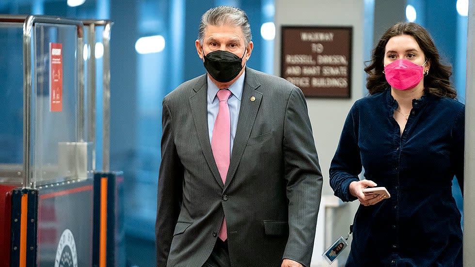 Sen. Joe Manchin (D-W.Va.) arrives to the Capitol for a cloture vote regarding a nomination on Wednesday, January 5, 2022.