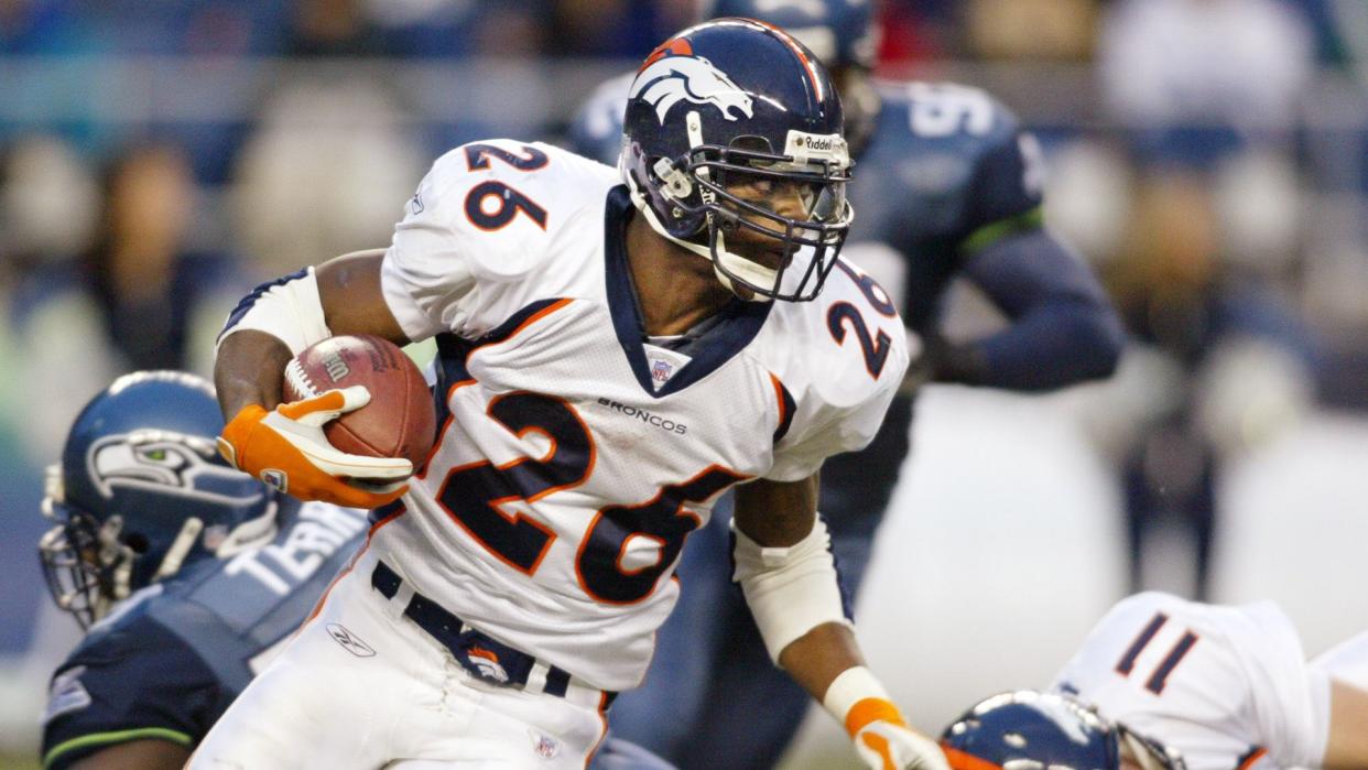 Mandatory Credit: Photo by John Froschauer/AP/Shutterstock (6433221d)PORTIS Denver Broncos' Clinton Portis runs for five yards against the Seattle Seahawks during the fourth quarter in Seattle .