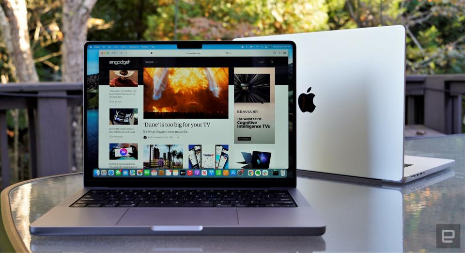 MacBook Pro 14-inch and 16-inch sitting on a table(2021)