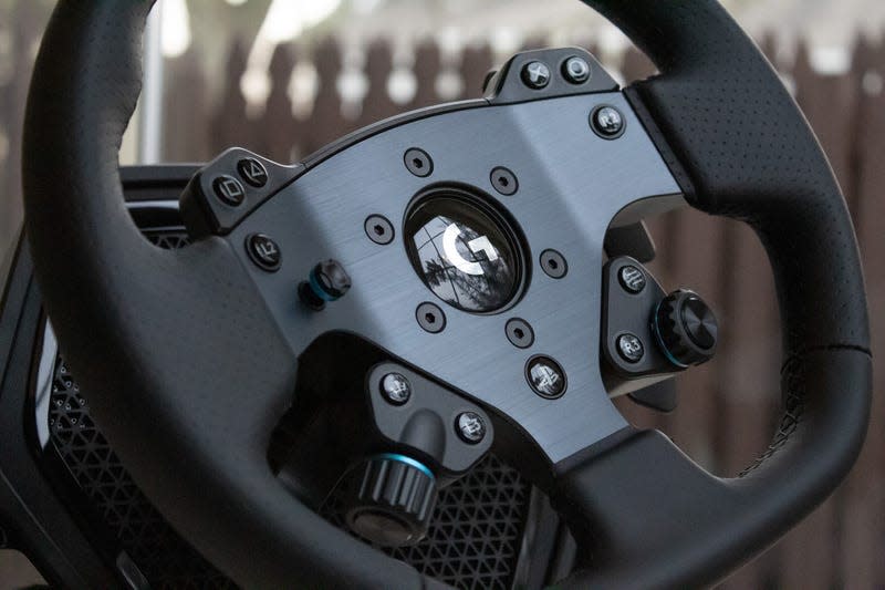 Close up on spokes and controls on Logitech G Pro steering wheel.