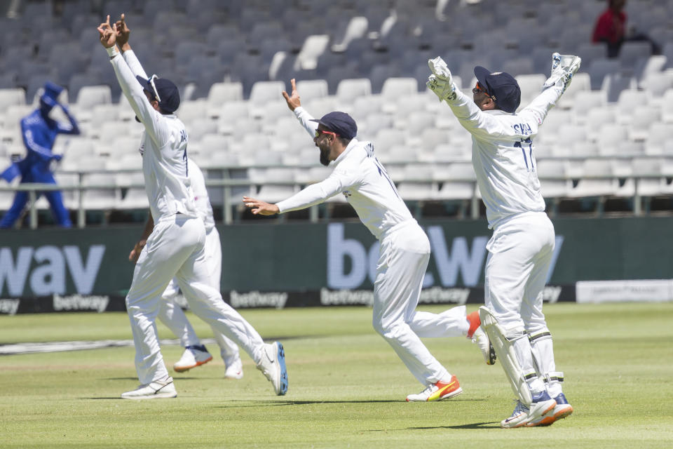 India appeal for a wicket during the second day of the third and final test match between South Africa and India in Cape Town, South Africa, Wednesday, Jan. 12, 2022. (AP Photo/Halden Krog)