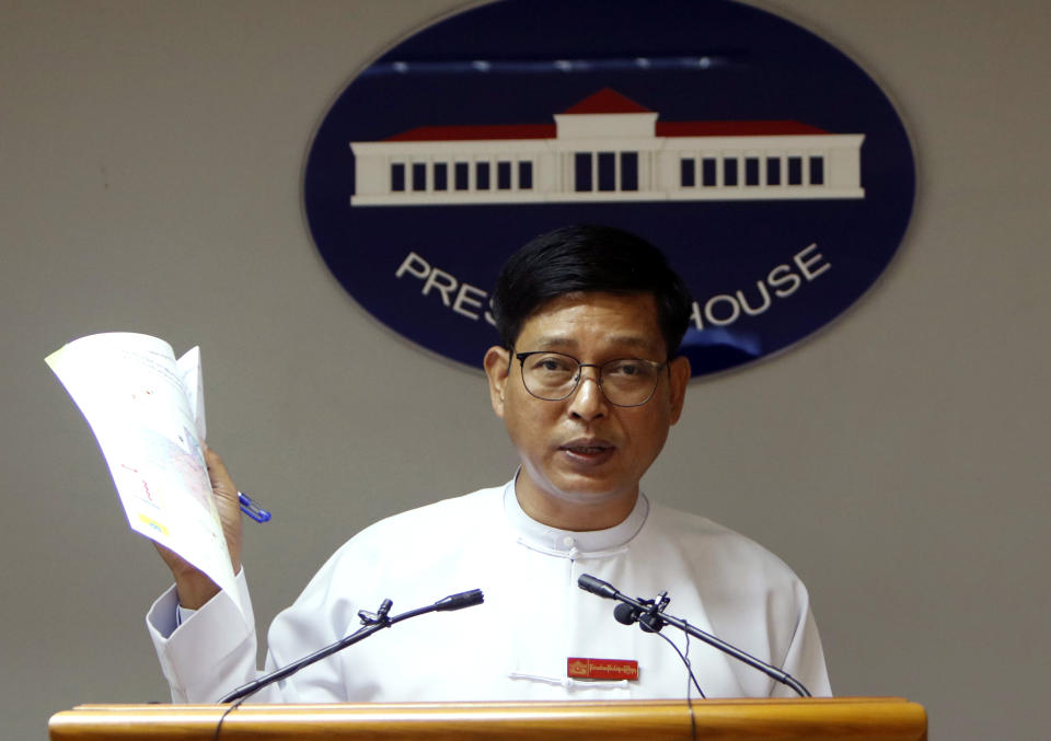 Myanmar's government spokesman Zaw Htay talks to journalists during a press briefing at the Presidential Palace in Naypyitaw, Myanmar, Friday, Aug. 16, 2019. Myanmar and Bangladesh are making a second attempt to start repatriating Rohingya Muslims after more than 700,000 of them fled a security crackdown in Myanmar almost two years ago, the U.N. refugee agency said Friday. (AP Photo/Aung Shine Oo)