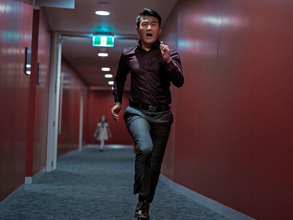 Ronny Chieng running from M3GAN