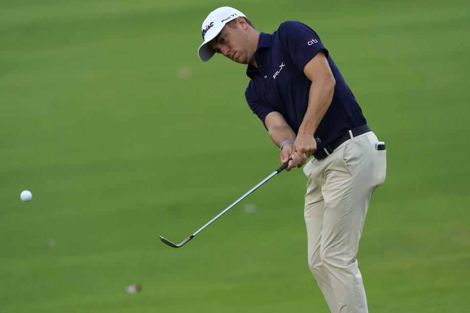 Justin Thomas chips onto the 10th green during the second round of the Sony Open PGA Tour golf event, Friday, Jan. 10, 2020, at Waialae Country Club in Honolulu. (AP Photo/Matt York)