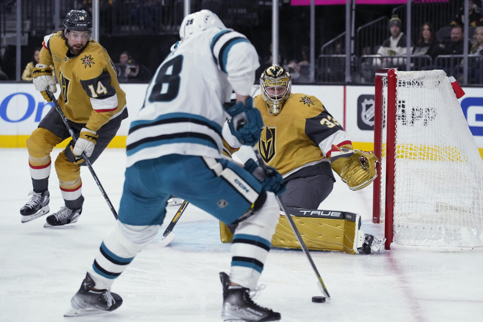 San Jose Sharks right wing Timo Meier (28) looks to shoot against Vegas Golden Knights goaltender Adin Hill (33) during the first period of an NHL hockey game Thursday, Feb. 16, 2023, in Las Vegas. (AP Photo/John Locher)