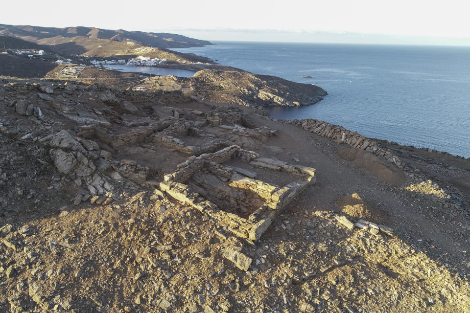 In this photo released by the Greek Culture Ministry on Wednesday, June 7, 2023, the excavated remains of an ancient sanctuary on the Aegean Sea island of Kythnos. Archaeologists excavating a hilltop sanctuary on the Aegean Sea island of Kythnos have discovered “countless” pottery offerings left there by ancient worshippers over the centuries, Greece's Culture Ministry said Wednesday Several ceremonial pottery vessels were also unearthed which are linked with the worship of Demeter, the ancient Greek goddess of agriculture, and her daughter Persephone, to which the building complex was dedicated. (Alexandros Mazarakis Ainian/Greek Culture Ministry via AP)