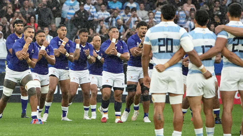 Samoa facing Argentina before Rugby World Cup game. Credit: Alamy