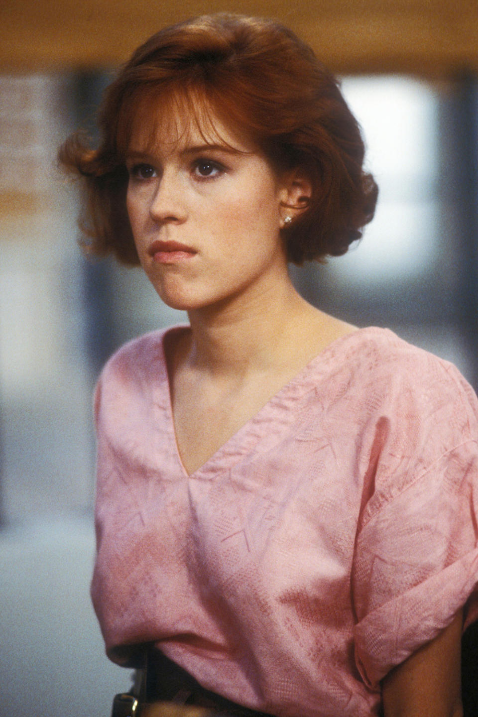 <p>Ringwald's cropped auburn hair and wispy, long bangs were her signature throughout the '80s — though we think they're pretty timeless! </p>