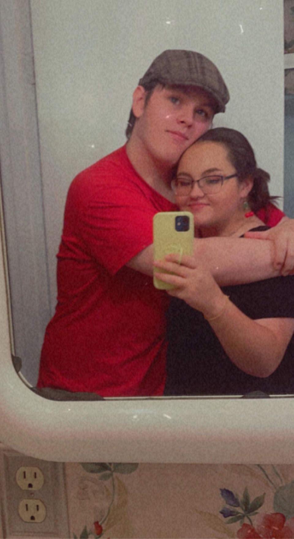 Aaron "Mick" Crawford with his sister, Rachel. Aaron Crawford, 18, died suddenly after volunteering to help flooding victims in Eastern Kentucky.