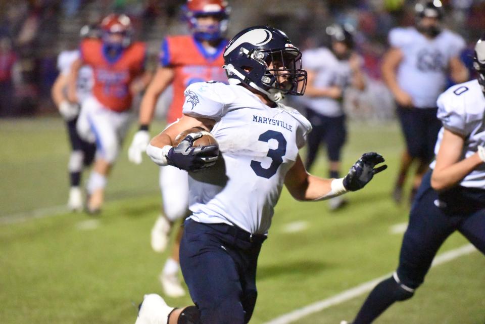 Marysville's Carter Saccucci carries the ball during a game earlier this season.