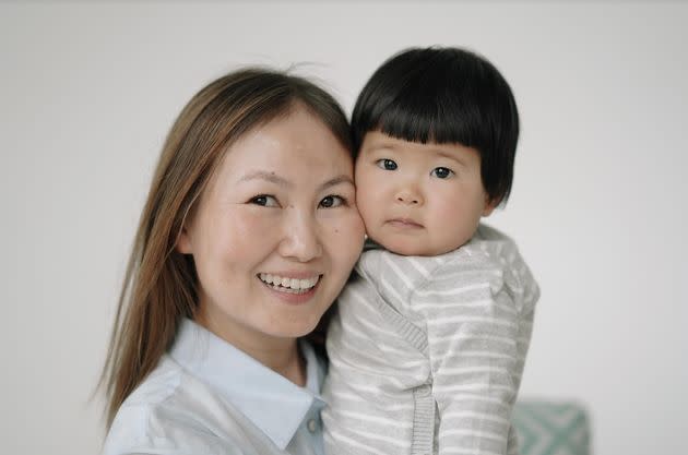 The author with her almost 1-year-old daughter in February 2022.