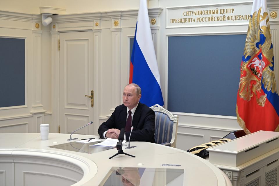 FILE - Russian President Vladimir Putin watches a training to test the strategic deterrence forces via videoconference in Moscow, Russia, Oct. 26, 2022. Putin monitored drills of the country's strategic nuclear forces involving multiple practice launches of ballistic and cruise missiles. (Alexei Babushkin, Sputnik, Kremlin Pool Photo via AP, File)