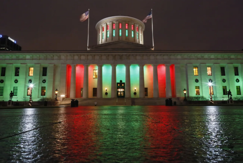 Christmas holiday lights of red and green adorn the Ohio Statehouse.