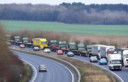 FILE PHOTO: A line of lorries is seen during a trial between disused Manston Airport and the Port of Dover of how road will cope in case of a "no-deal" Brexit, Kent