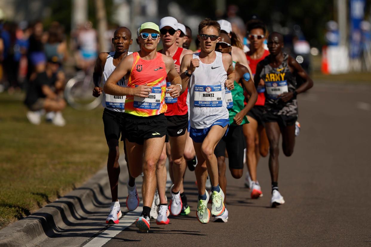 Runners race through the course during the 2024 U.S. Olympic Marathon Trials on Feb. 3, 2024 in Orlando, Florida.