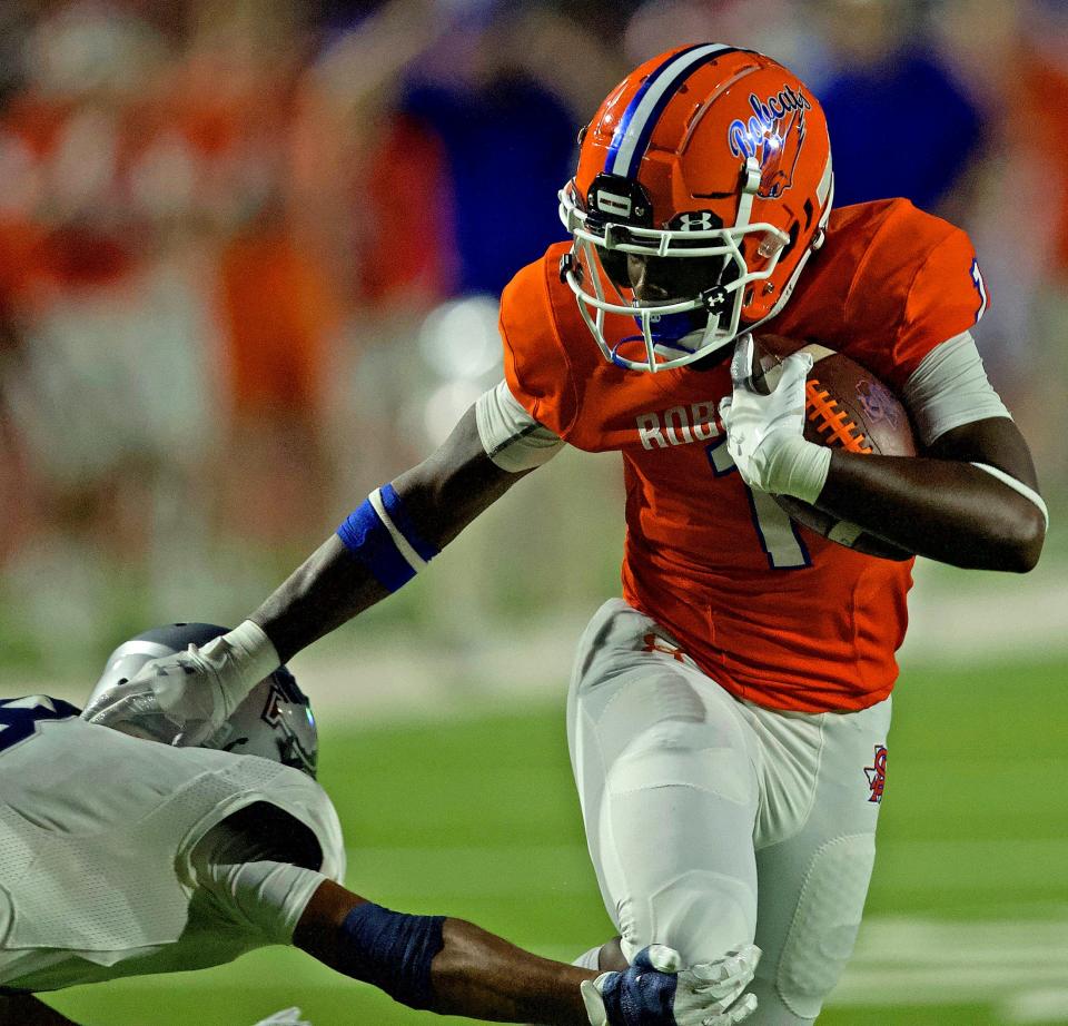 San Angelo Central High School receiver Jaedyn Gipson picks up yardage against Killeen Shoemaker at San Angelo Stadium on Friday, Aug. 27, 2021.