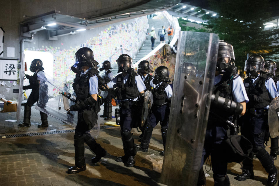 Riot police clear the streets outside the Legislative Council building, after protesters stormed the building on the anniversary of Hong Kong's handover to China, in Hong Kong, China July 2, 2019. REUTERS/Thomas Peter