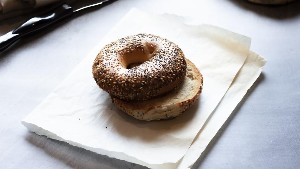 bagel sliced toasted,high angle view of food on table