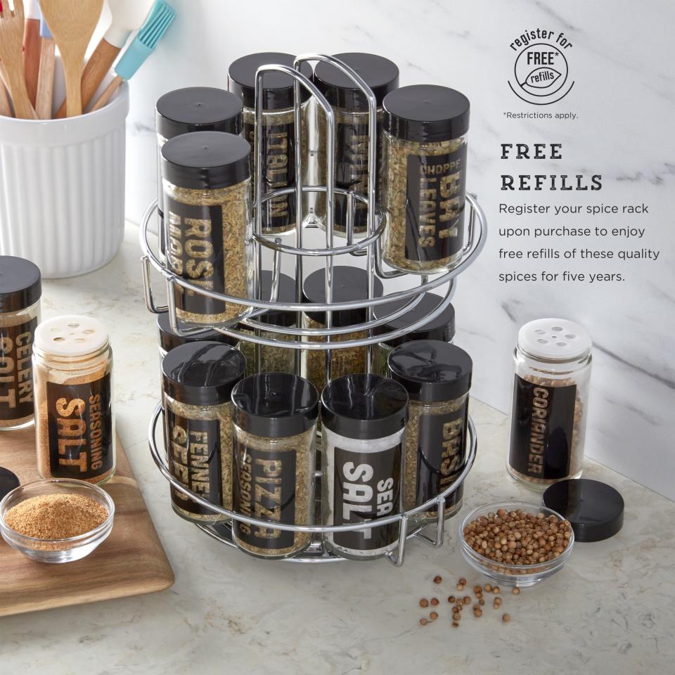 the spice rack on a counter with a note mentioning free refills on spices for five years