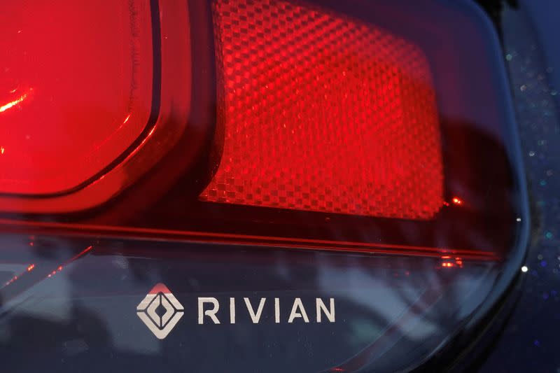 FILE PHOTO: The Rivian name and logo are shown on one of their new electic SUV vehicles in California