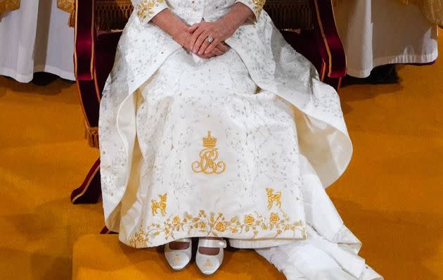Beth and Bluebell got front-and-center placement with just above the hem of Camilla&#39;s gold-emboidered gown.