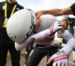 New overall leader, best young rider and best climber, Slovenia's Tadej Pogacar, reacts after crossing the finish line to win stage 20 of the Tour de France cycling race, an individual time trial over 36.2 kilometers (22.5 miles), from Lure to La Planche des Belles Filles, France, Saturday, Sept. 19, 2020. (Bernard Papon/Pool via AP)