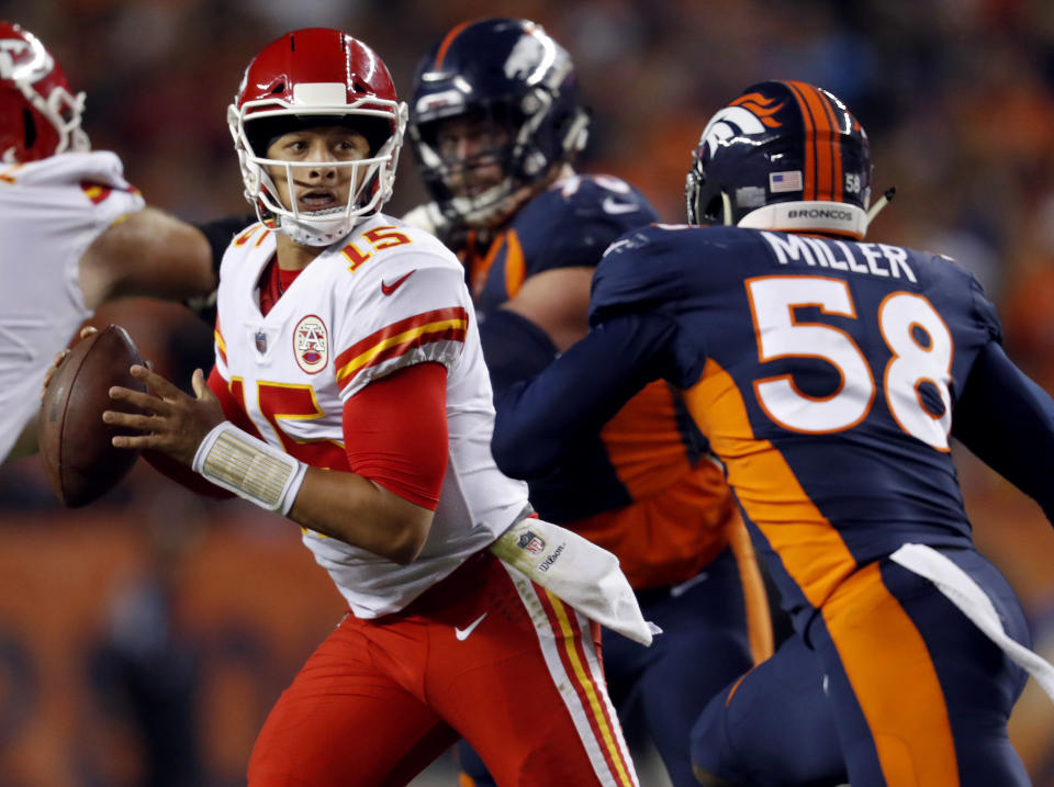 Quarterback Patrick Mahomes (15) led a big fourth-quarter comeback for the 4-0 Chiefs. (AP)