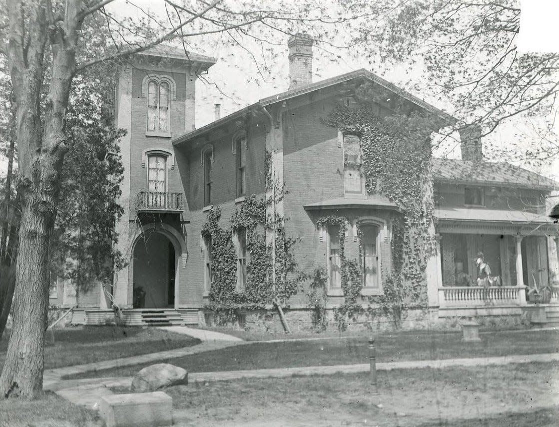 In this photo, the Weiss home at 55 E. Vine St. in Monroe is visible, including the carriage block in the foreground. Built by Spafford Hall, Weiss’s daughters, Hedwig, Lulu and Elsie, lived in the home prior to its becoming the Monroe Home for Blind Babies and General Hospital in 1910.
