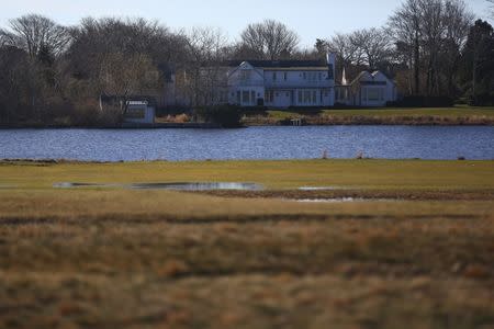 An estate is seen near a golf club in East Hampton, New York, March 16, 2016. REUTERS/Jeffrey Basinger