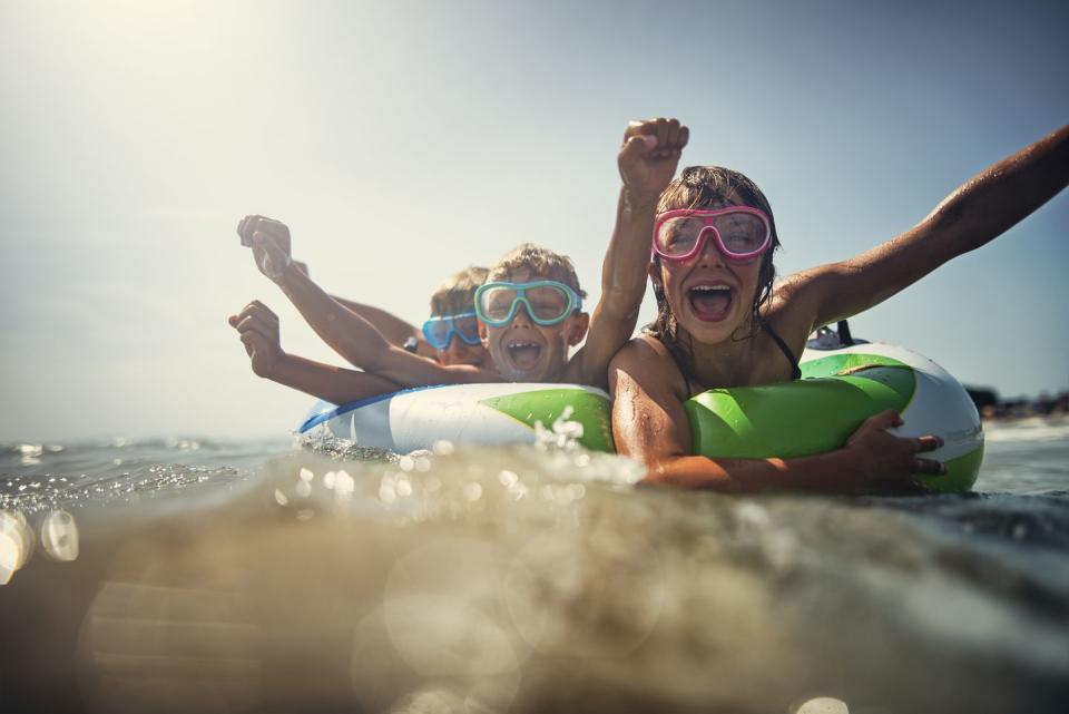 kids enjoying beach and sea vacations