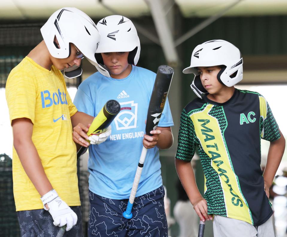 Middleboro 12U Nationals (New England) from left, Aaron Davis, Cayden Ellis, and Shawn Miller, during batting practice at the Little League World Series in South Williamsport, PA on Tuesday, August 16, 2022.    