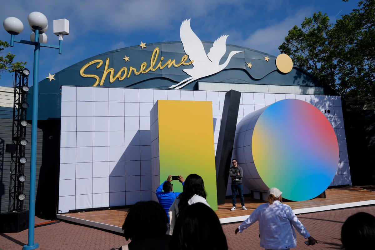 People take photos at a Google I/O event in Mountain View, Calif., Tuesday, 14 May, 2024 (The Associated Press)