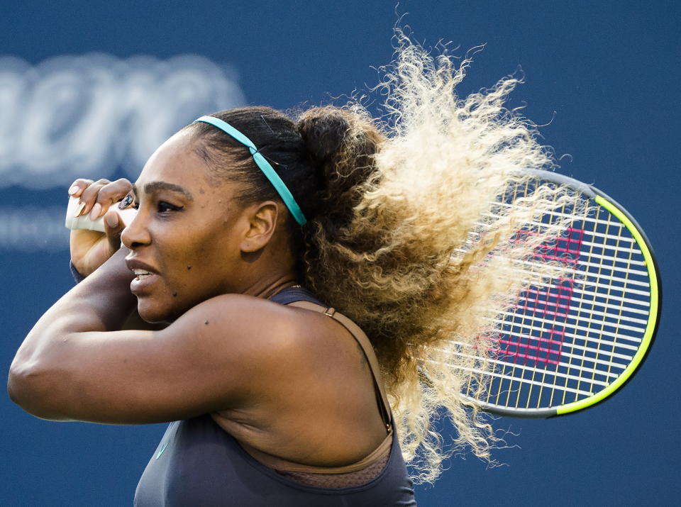 Serena Williams, of the United States, watches a return to Ekaterina Alexandrova, of Russia, during the Rogers Cup women’s tennis tournament Thursday, Aug. 8, 2019, in Toronto. (Nathan Denette/The Canadian Press via AP)
