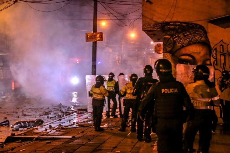 Police officers confront demonstrators in Bogota, early on September 10, 2020.  / Credit: STR/AFP via Getty